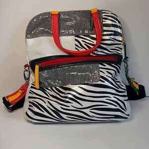 Cirque Du Soleil by Joanel handbag, Genuine leather